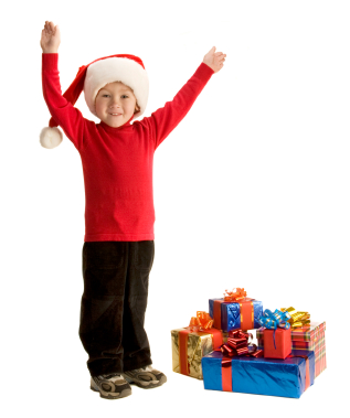 Boy in Santa Claus hat with presents